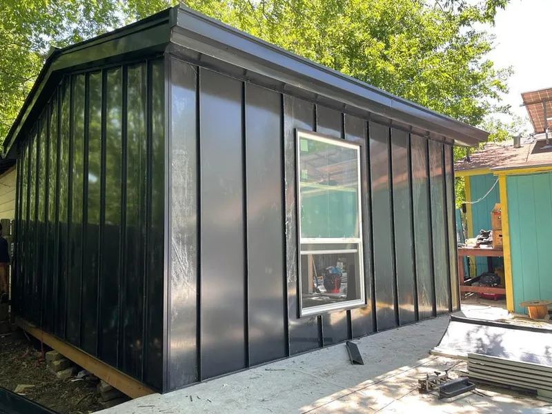 Black standing seam metal wall panels for Roof Inspection in Santa Maria