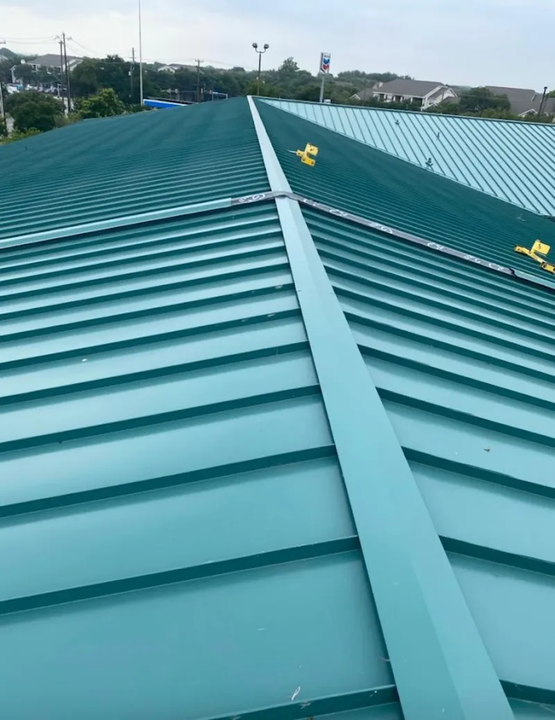 Green commercial metal roof ridge and valley for Metal Roof Repair in Santa Maria